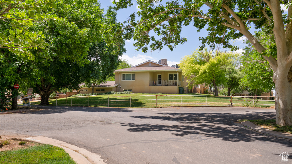 View of front of property featuring a front lawn