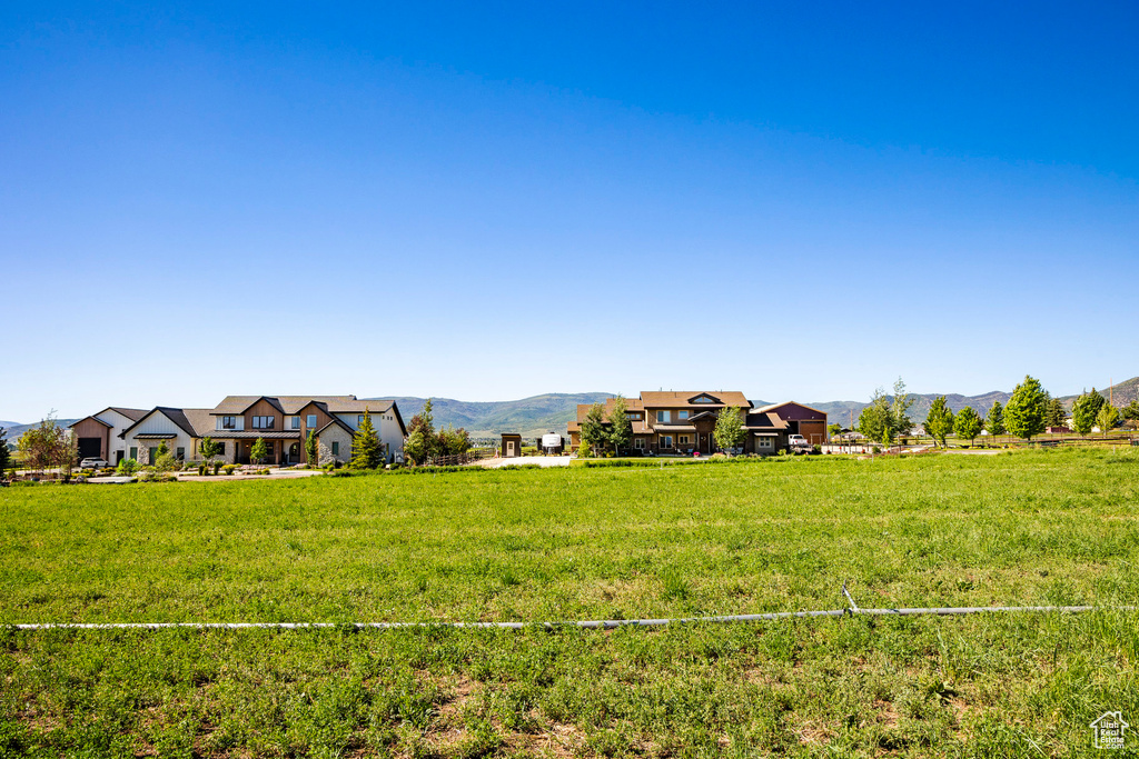 View of yard with a mountain view