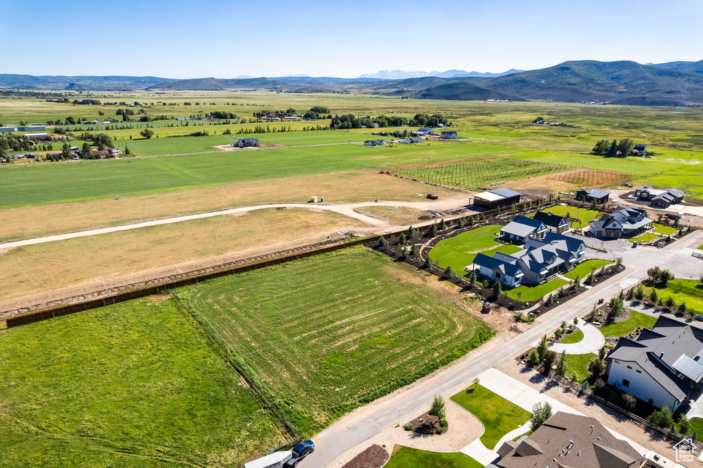Bird's eye view featuring a rural view, a residential view, and a mountain view