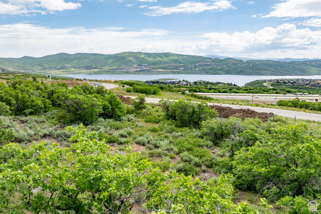 View of mountain background featuring a nearby body of water