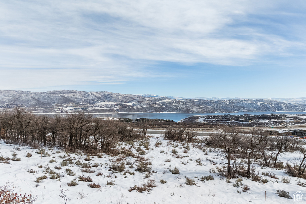 View of mountain background featuring a large body of water