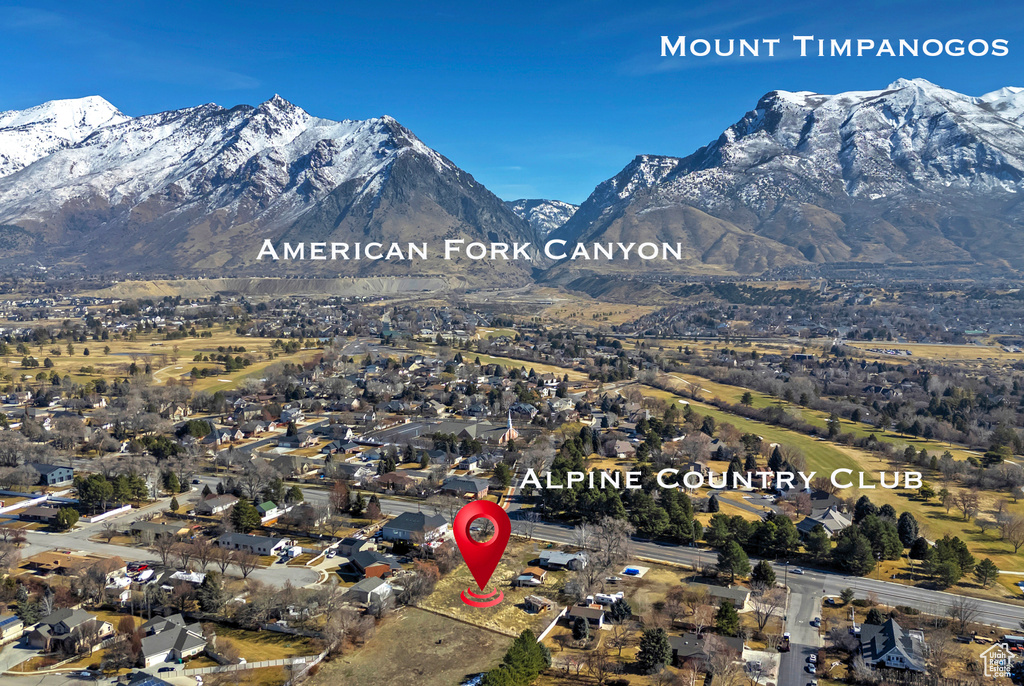 Property view of mountains featuring a residential view