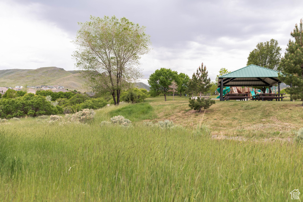 View of yard with a gazebo and a mountain view