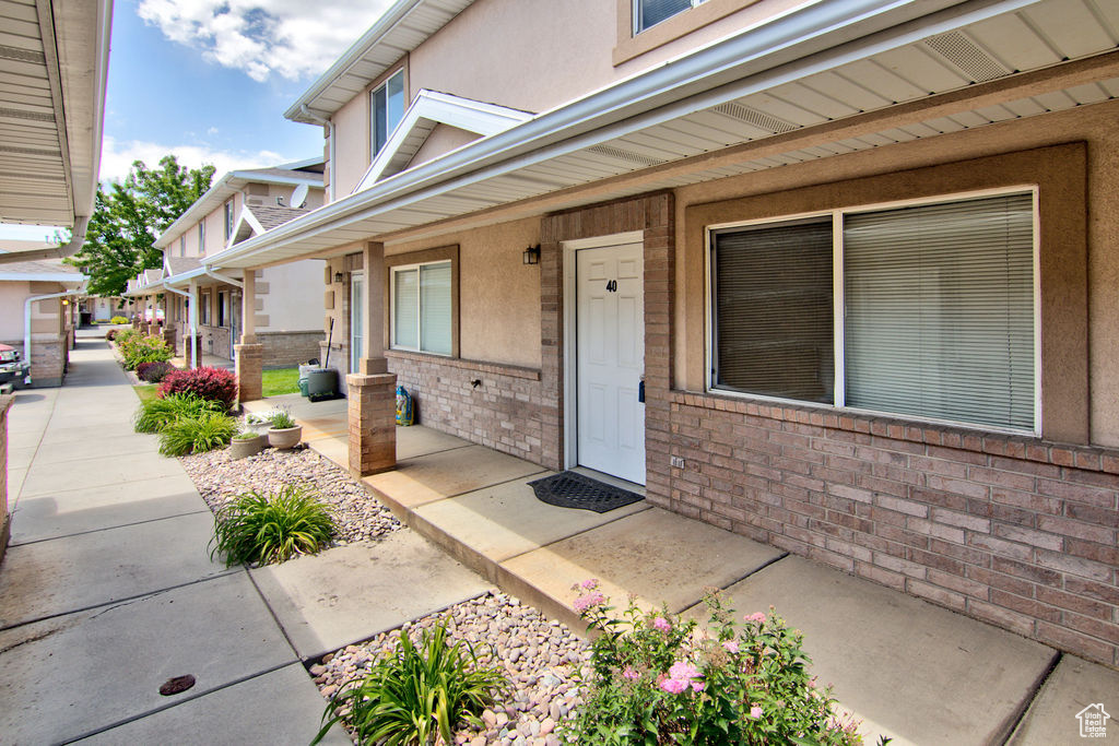 Entrance to property with covered porch