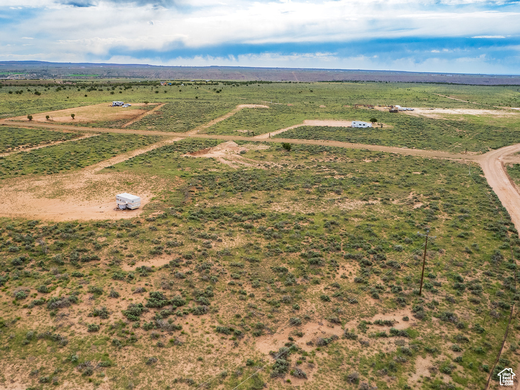 Birds eye view of property featuring a rural view