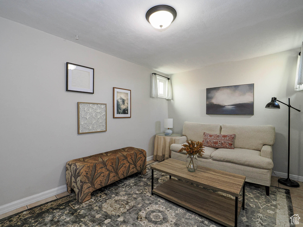 Tiled living room with baseboards