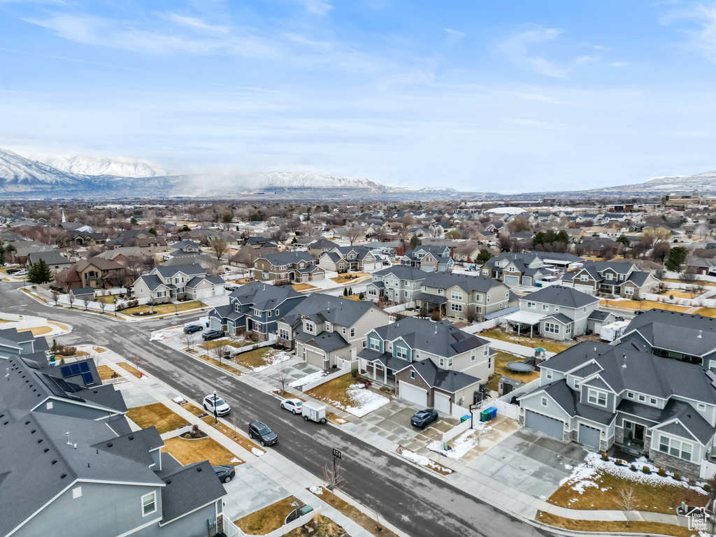 Drone / aerial view with a residential view and a mountain view