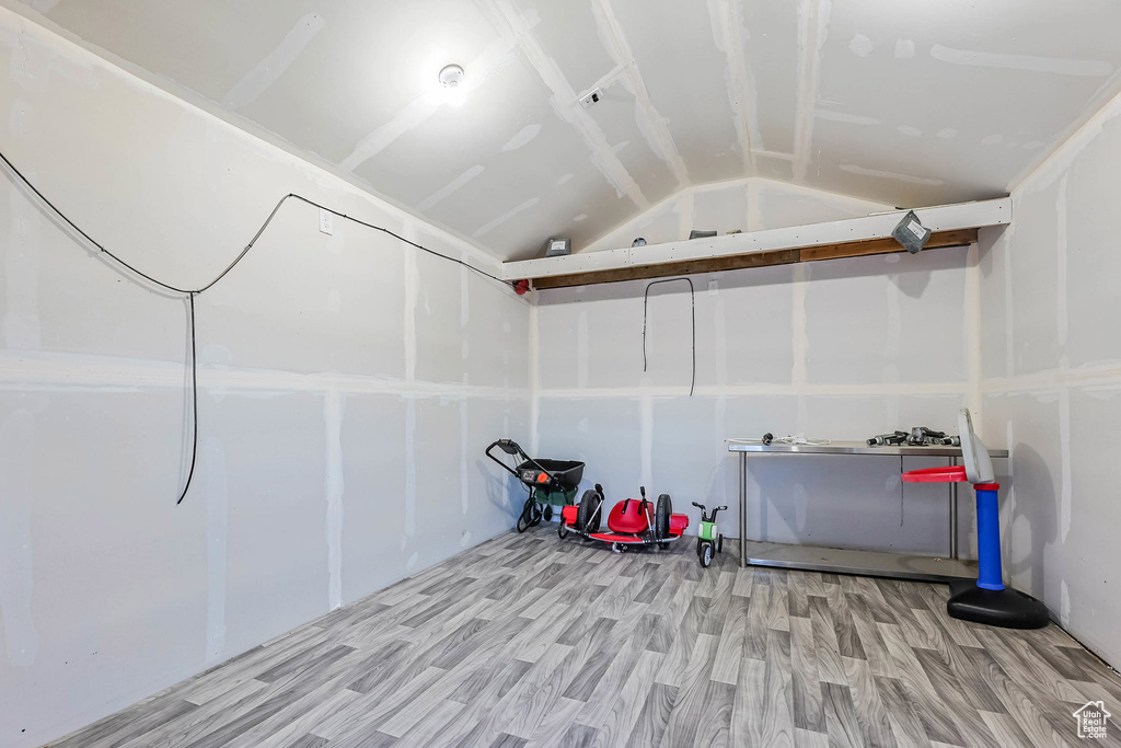 Below grade area featuring a garage and light wood-style flooring