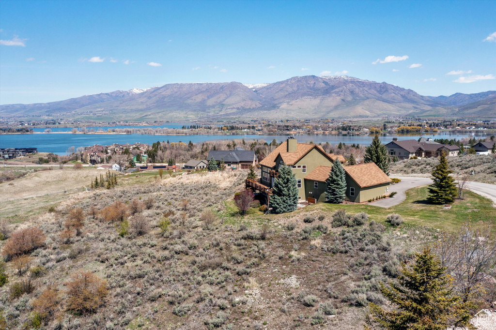 Mountain view featuring a water view