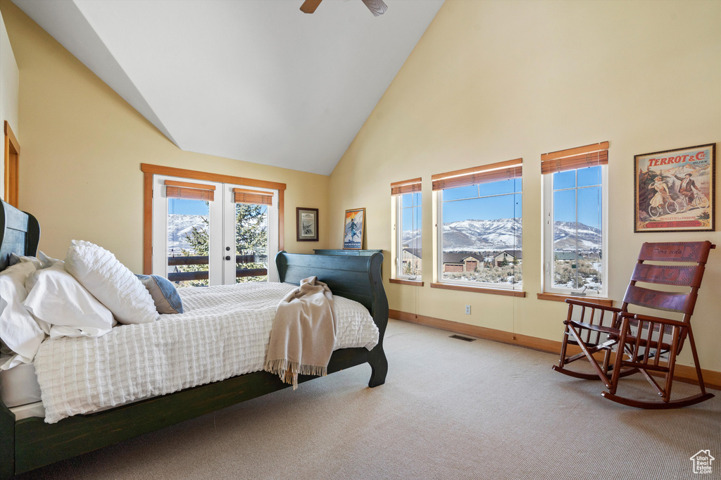 Bedroom with access to exterior, carpet, french doors, visible vents, and high vaulted ceiling