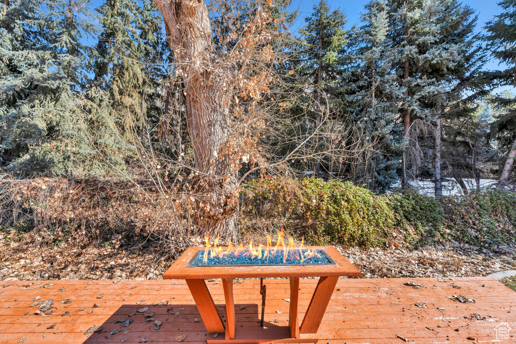 Exterior space featuring an outdoor fire pit