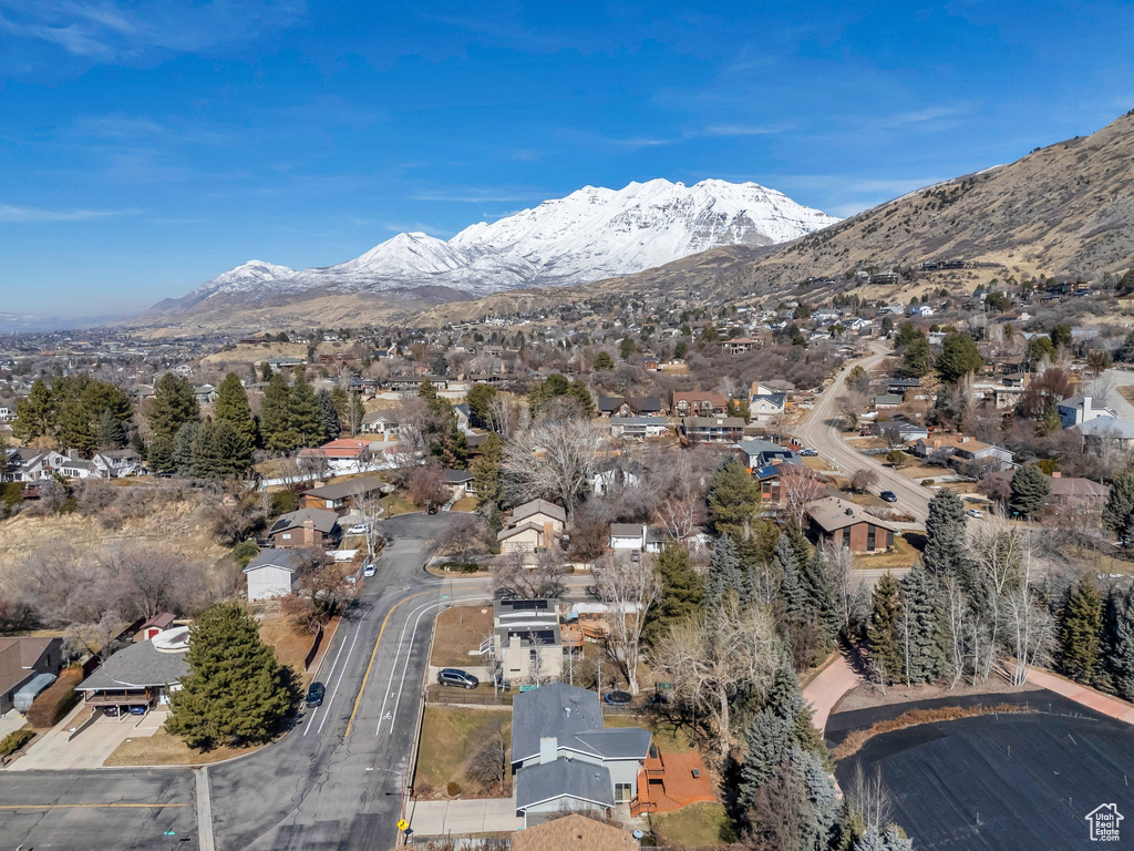 Birds eye view of property featuring a residential view and a mountain view