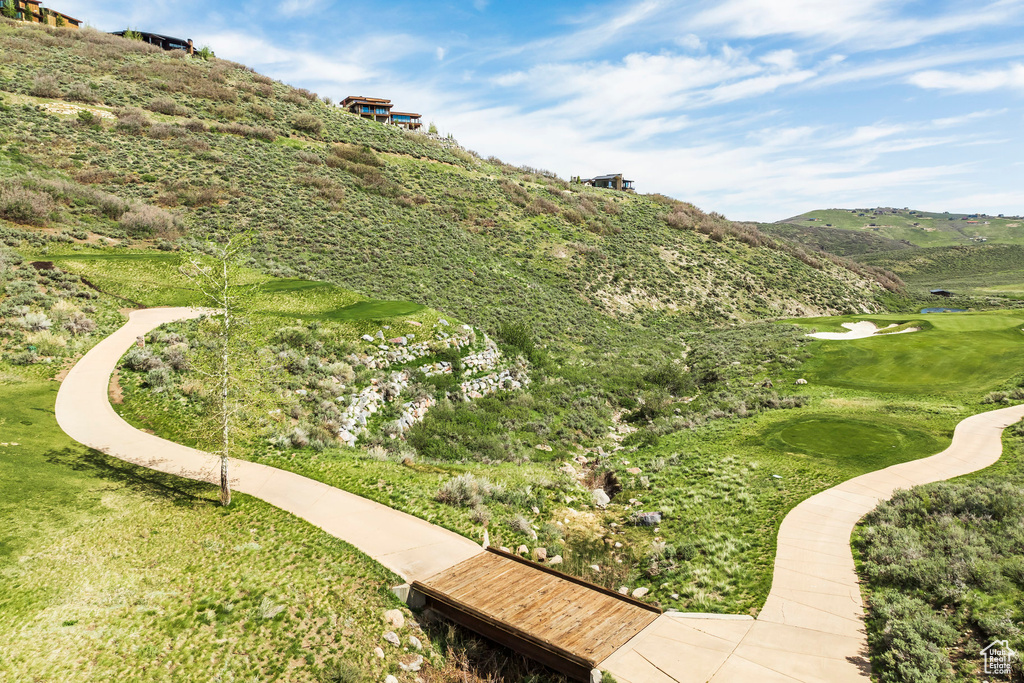 View of property\\\'s community featuring a mountain view and golf course view