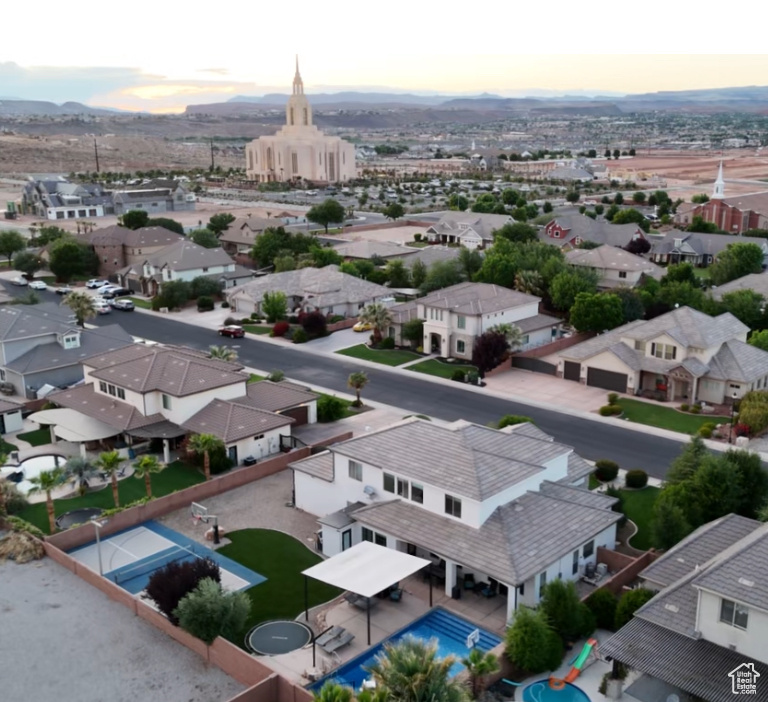 Aerial view of residential area with a mountainous background