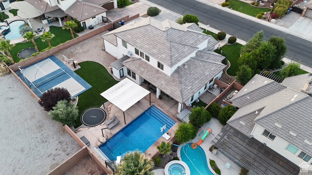 Aerial view of residential area with a pool