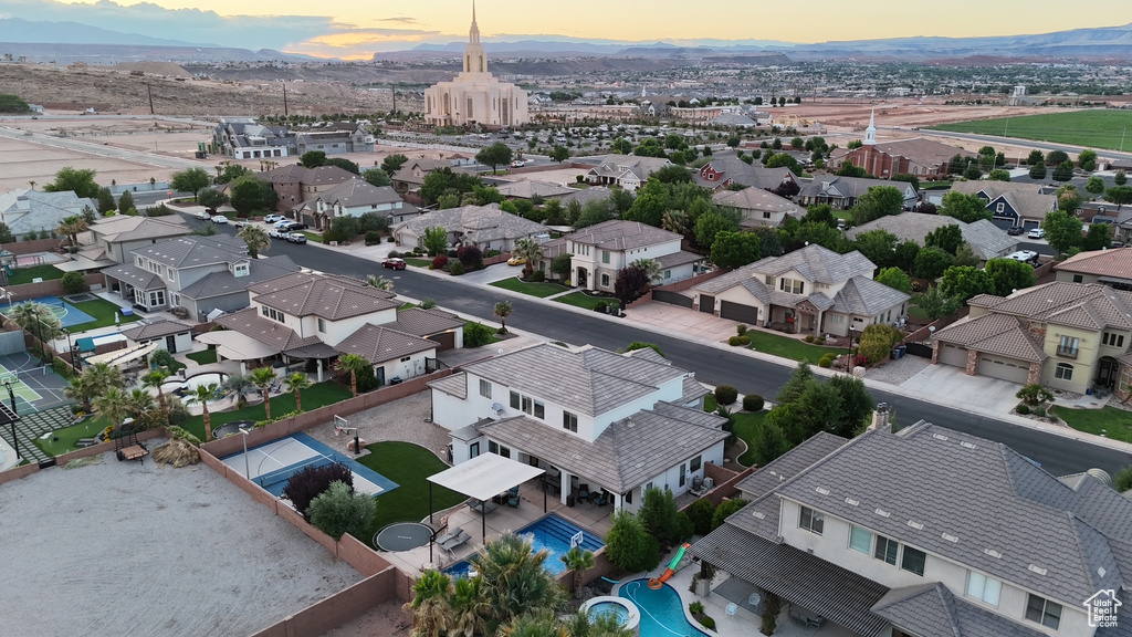 Aerial view at dusk of a residential view and a mountain view