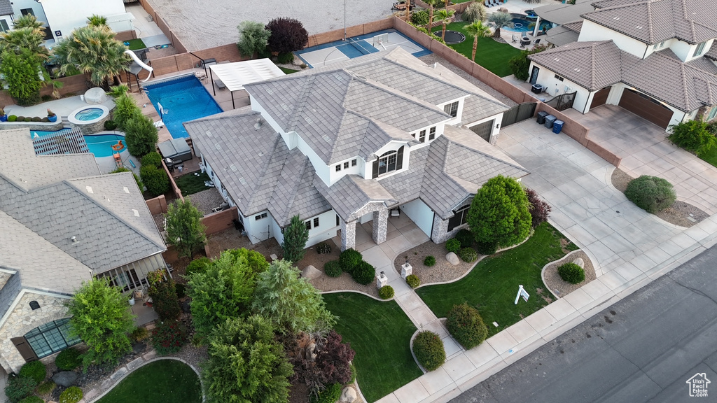 Aerial view of residential area featuring a pool area