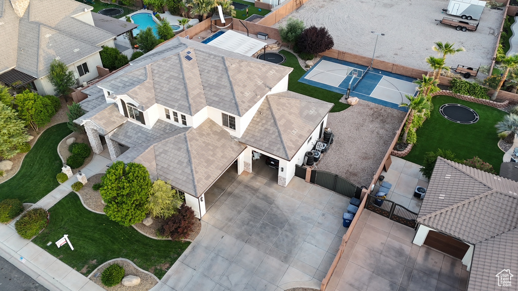 View of subject property with a pool area