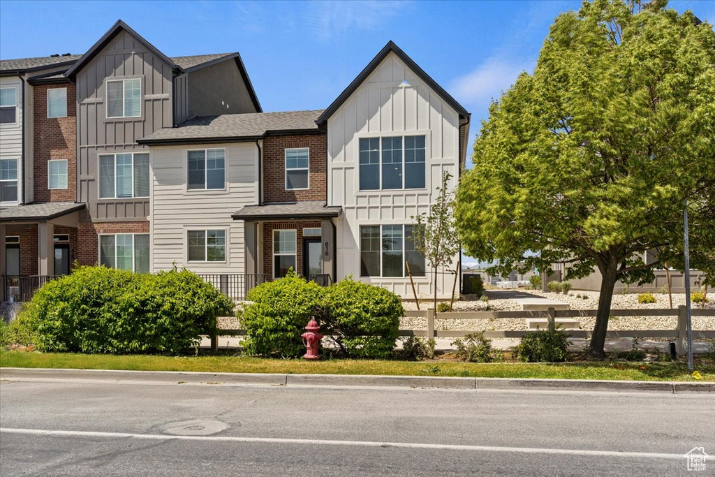 View of front of house featuring board and batten siding