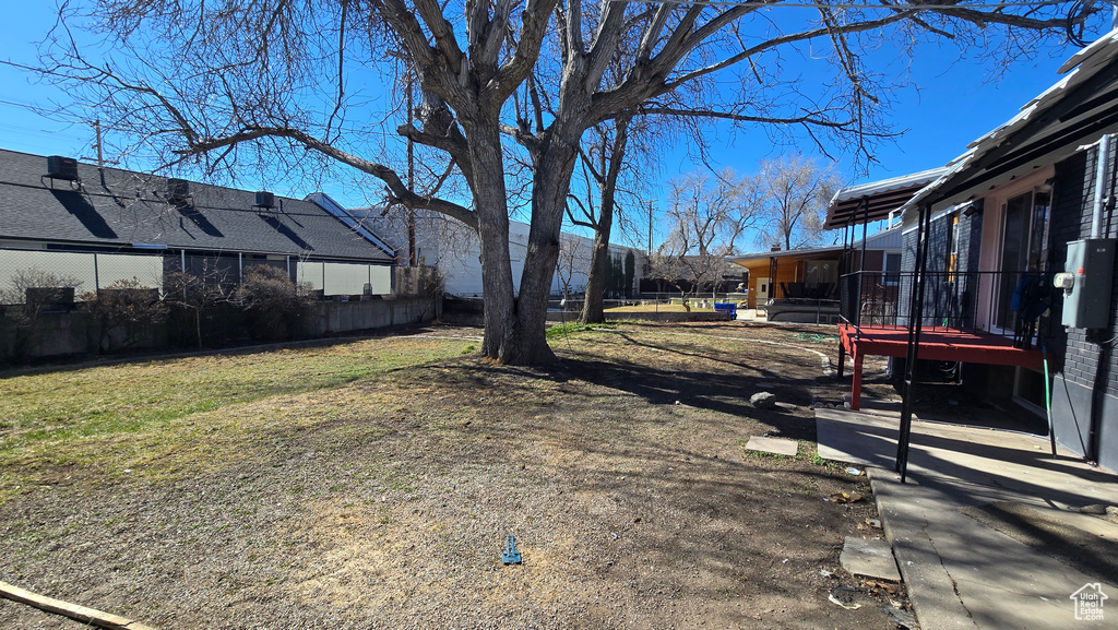 View of yard with fence