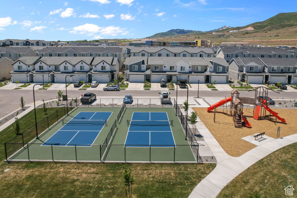 Drone / aerial view with a residential view and a mountain view