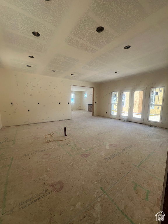 Unfurnished room featuring healthy amount of natural light