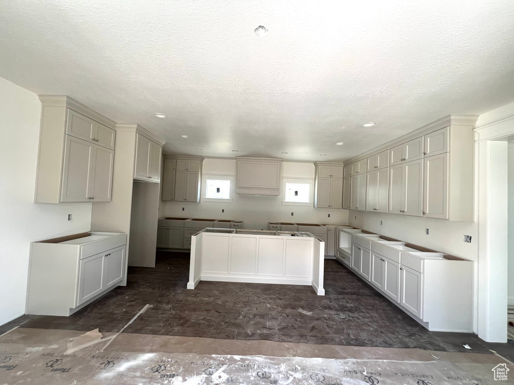 Kitchen featuring a center island and recessed lighting