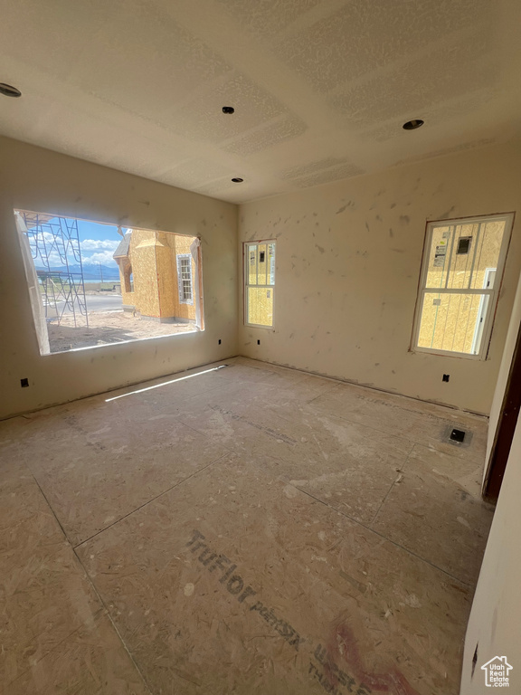 Spare room with a textured ceiling