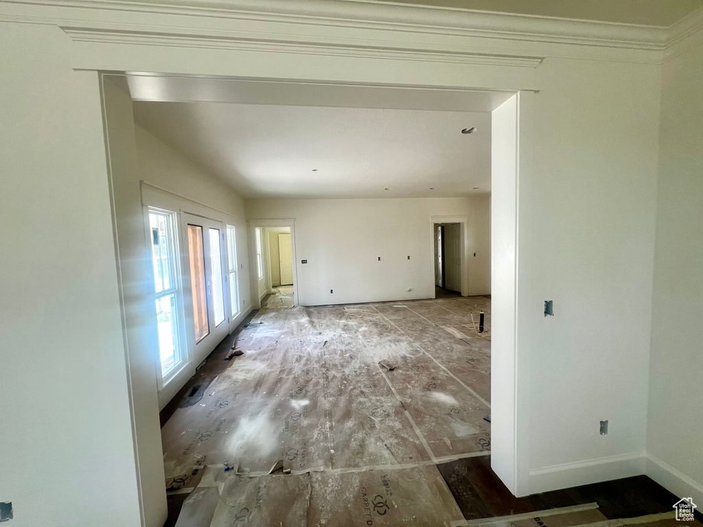 Unfurnished room with baseboards