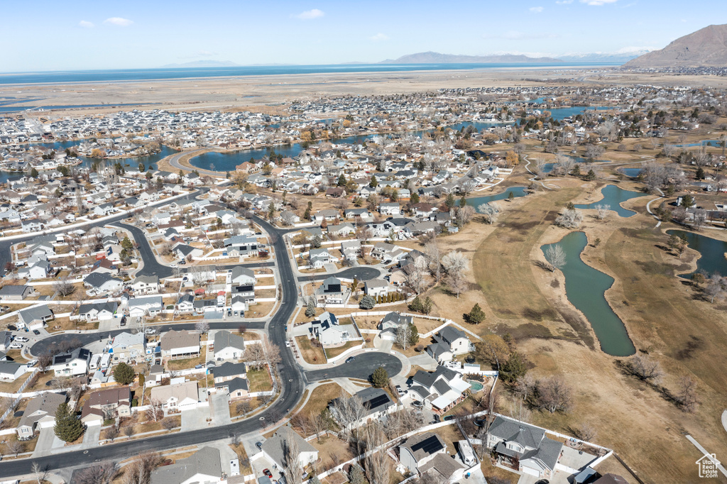 Aerial view with a residential view and a water and mountain view