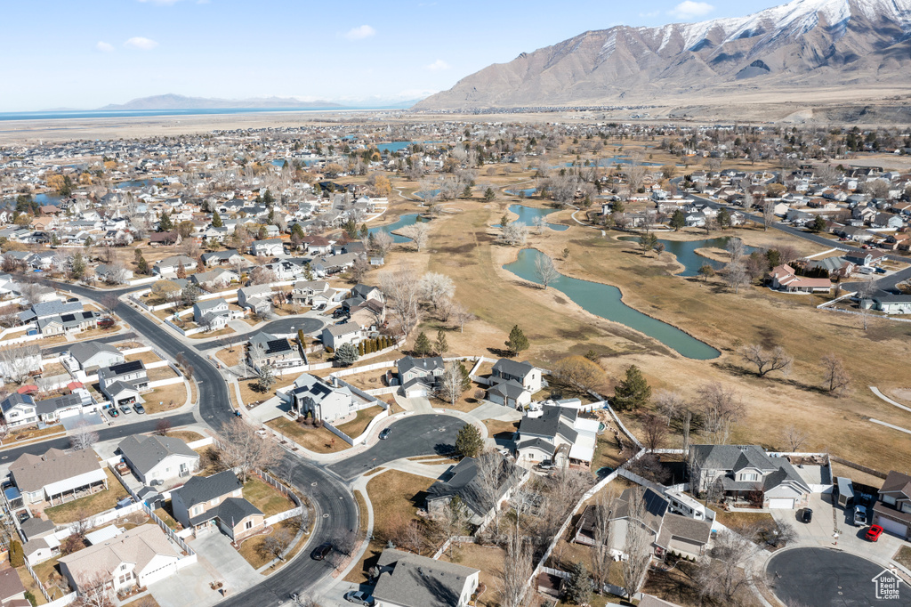 Aerial view featuring a residential view and a water and mountain view