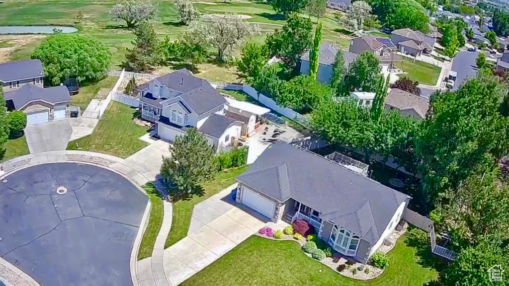 Aerial view of residential area with a golf club