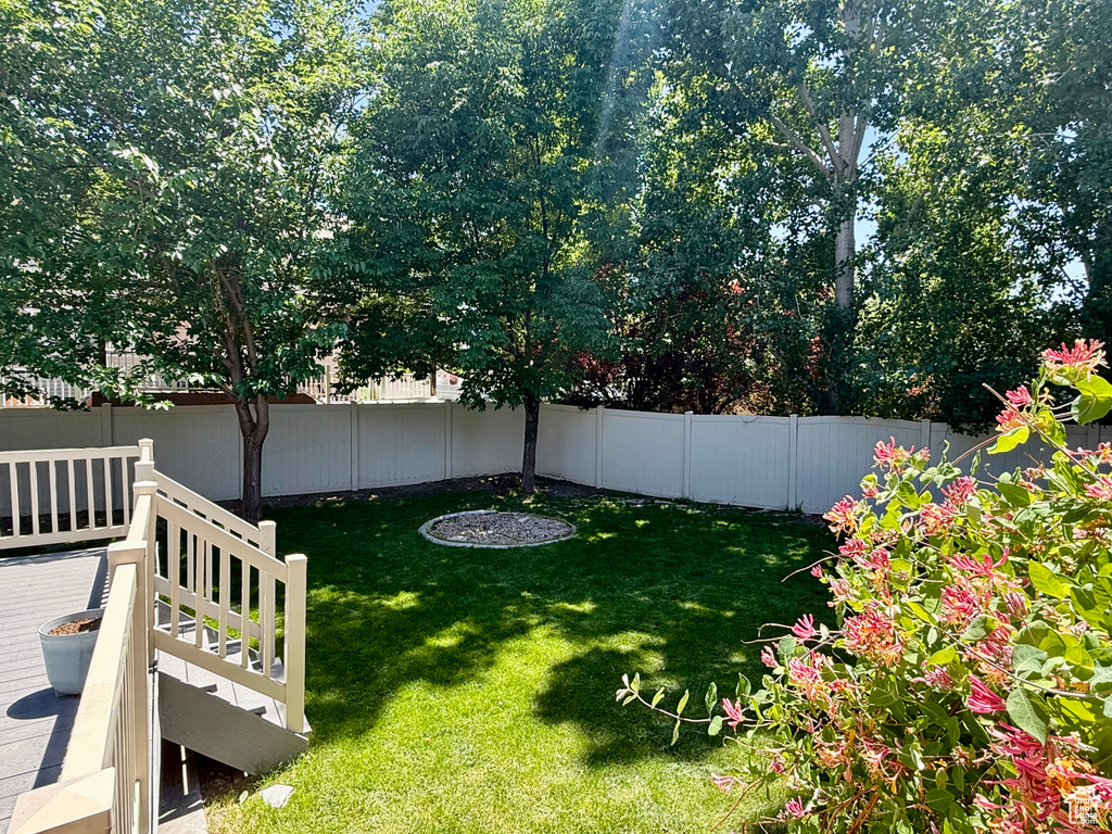 View of yard featuring a deck