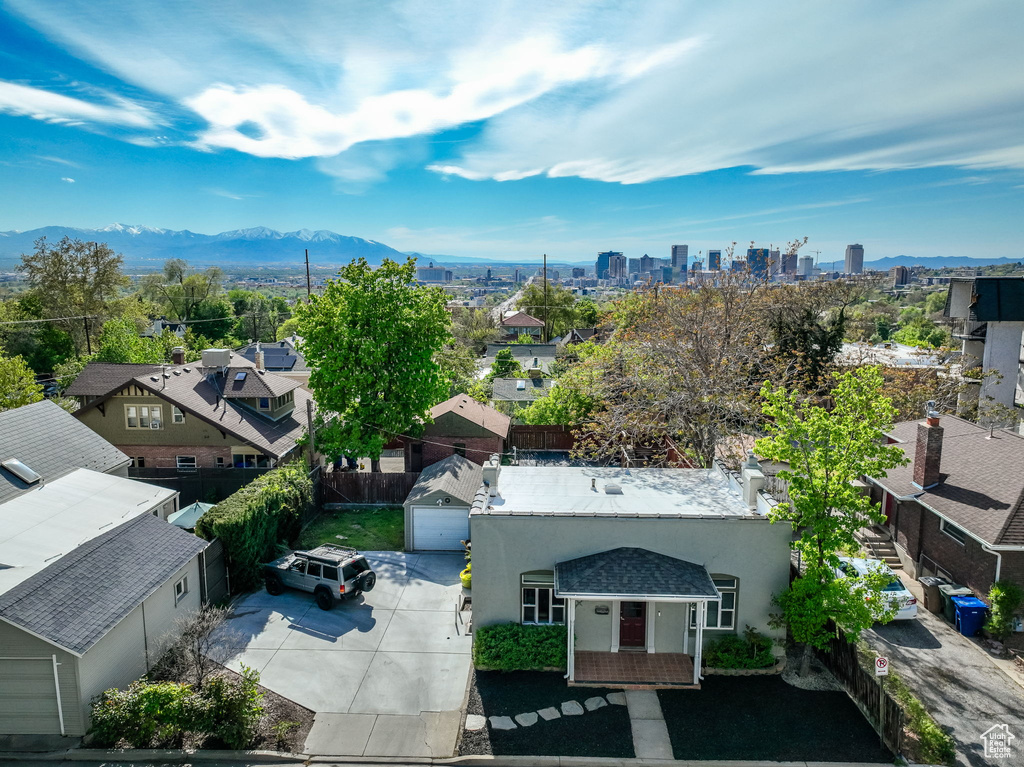 Drone / aerial view featuring a residential view, a city view, and a mountain view