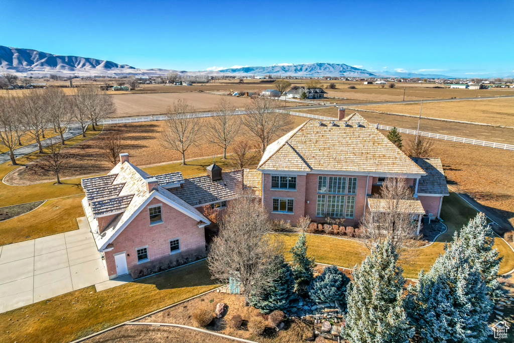 Birds eye view of property featuring a rural view and a mountain view