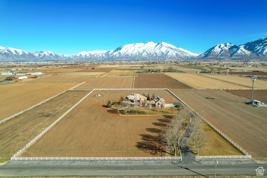 Drone / aerial view with a mountain view and a rural view