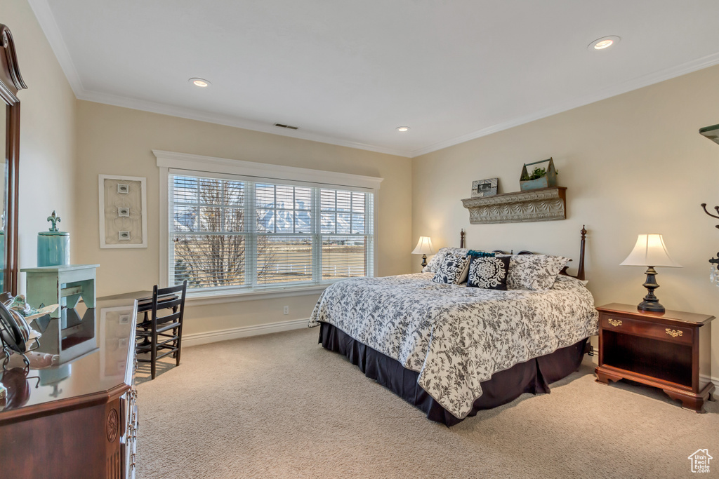 Bedroom featuring ornamental molding, recessed lighting, carpet flooring, and baseboards