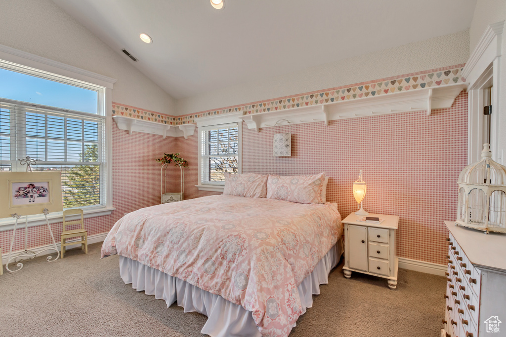 Bedroom featuring baseboards, visible vents, vaulted ceiling, carpet floors, and recessed lighting