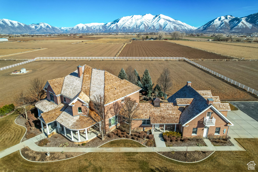 Birds eye view of property featuring a rural view and a mountain view