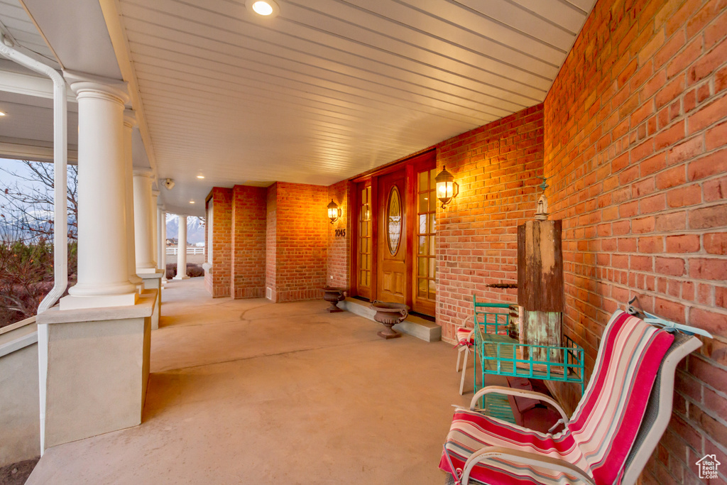 View of patio with a porch