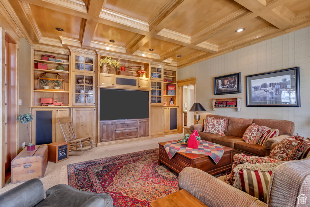 Living area with light carpet, built in features, coffered ceiling, beamed ceiling, and crown molding