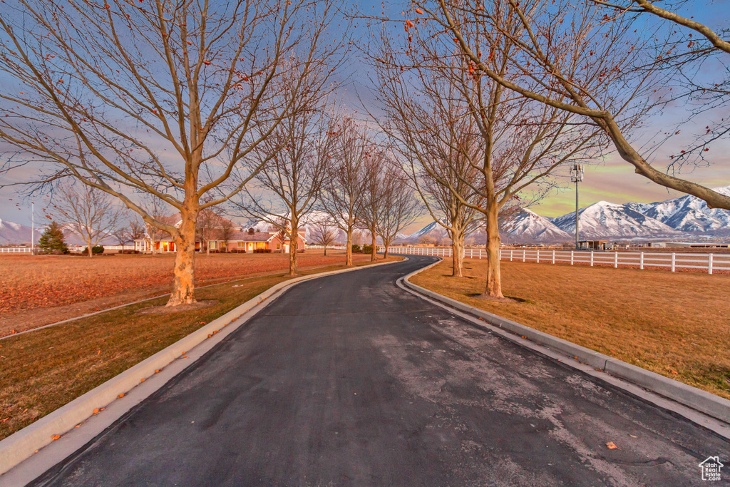 View of street featuring curbs and a mountain view