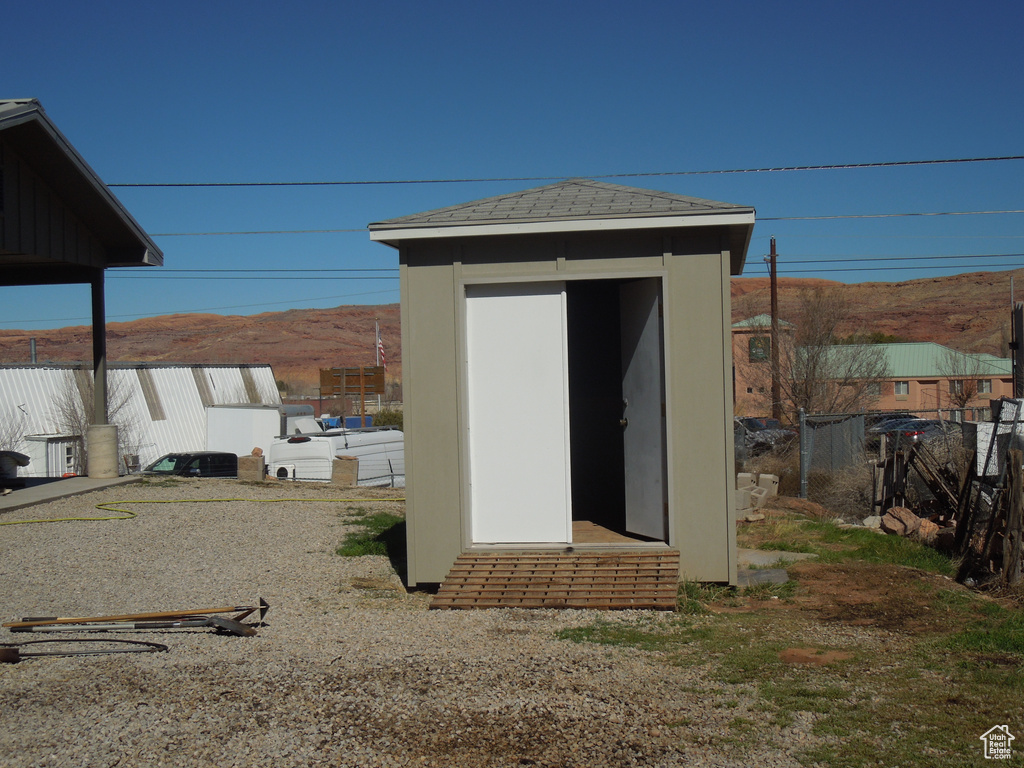 View of shed with fence