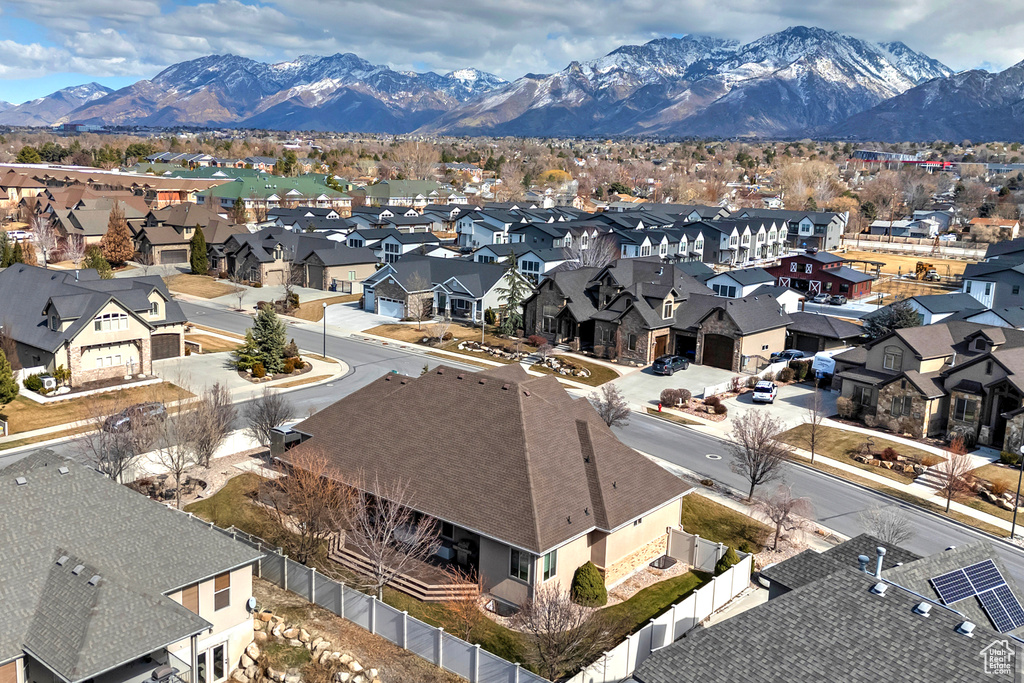 Drone / aerial view with a residential view and a mountain view