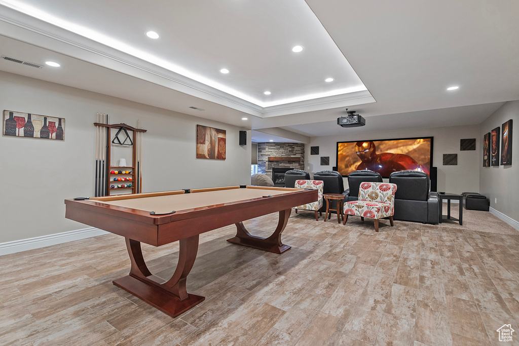 Rec room featuring recessed lighting, visible vents, and light wood-style floors