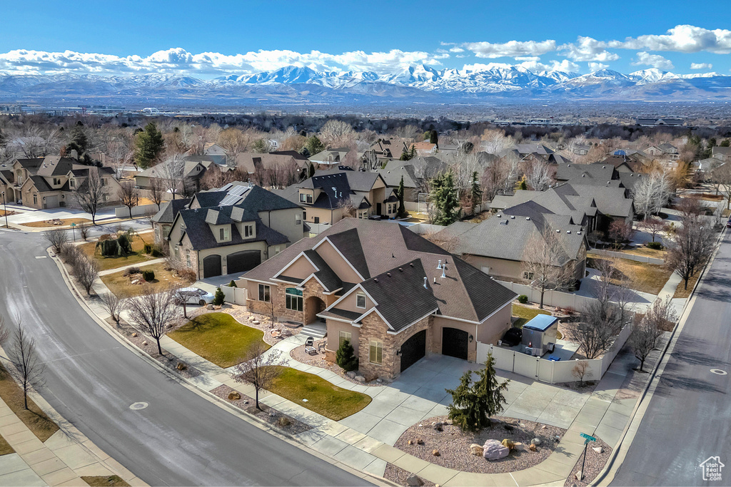 Aerial view featuring a mountain view and a residential view