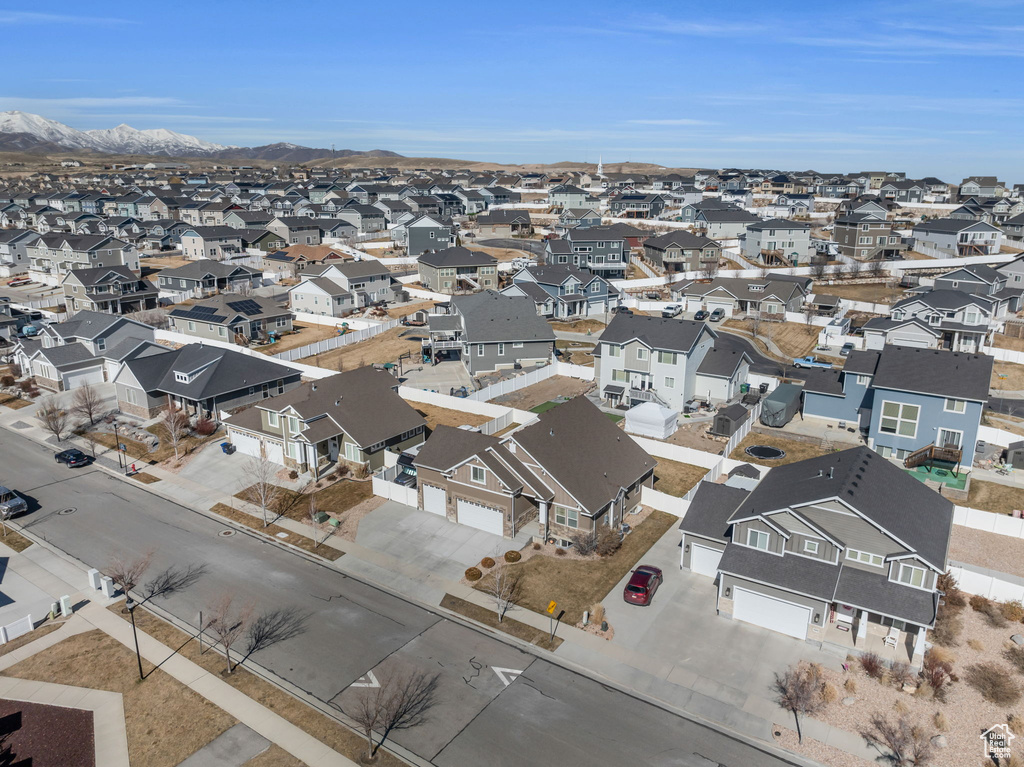 Birds eye view of property featuring a mountain view and a residential view