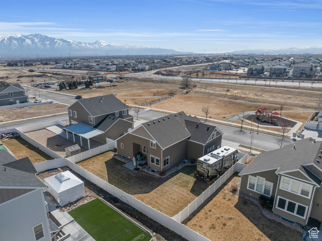 Drone / aerial view featuring a residential view and a mountain view