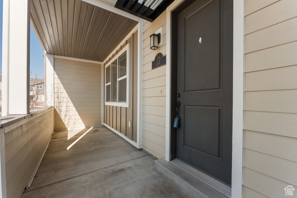 Doorway to property featuring a balcony