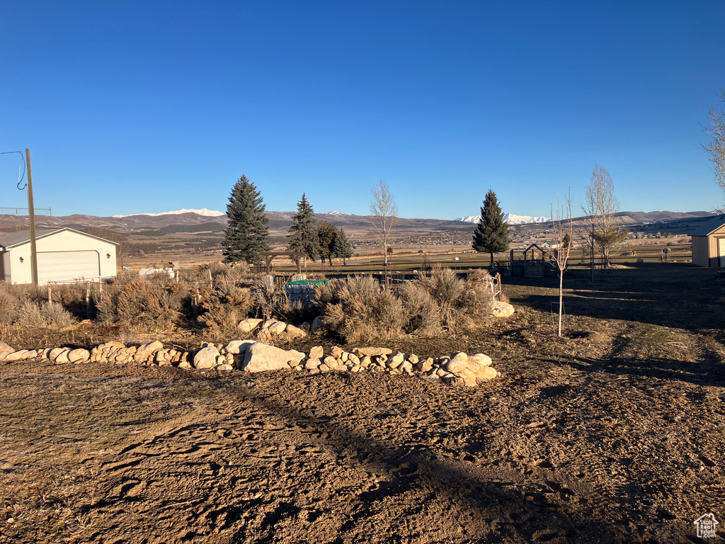 View of yard with a mountain view